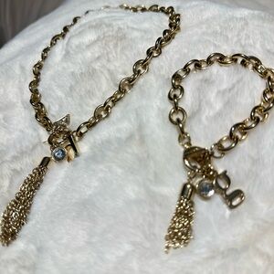 GUESS Elegant Gold Chain Bracelet with Tassel